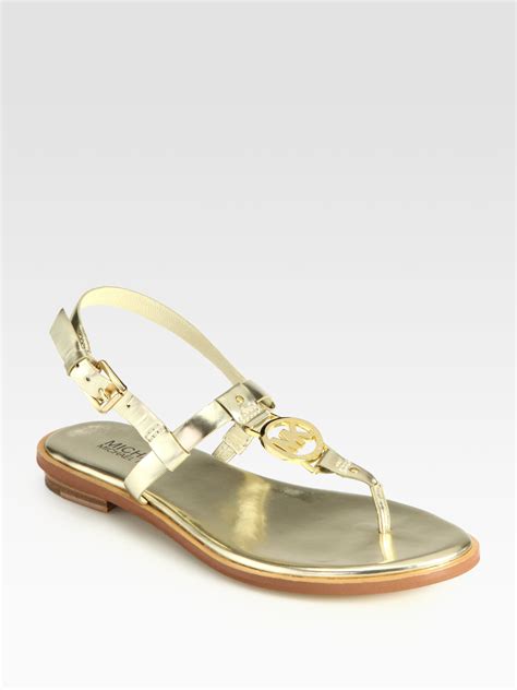 michael kors shoes sneakers gold|Michael Kors gold sandals sale.